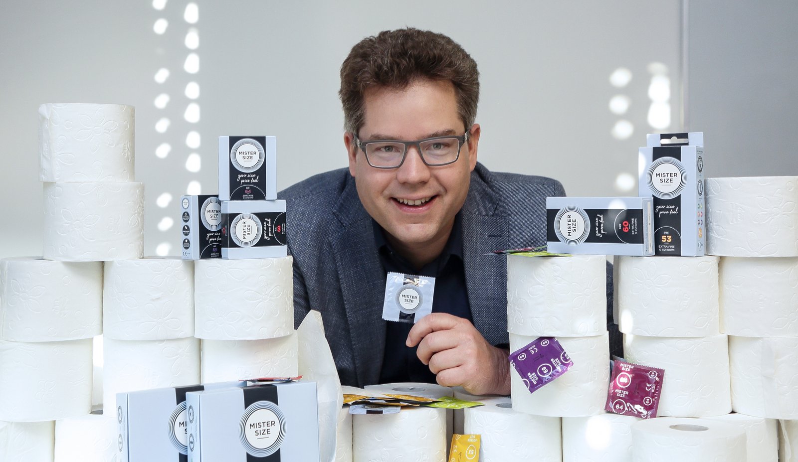 Jan Vinzenz Krause behind condoms and toilet paper