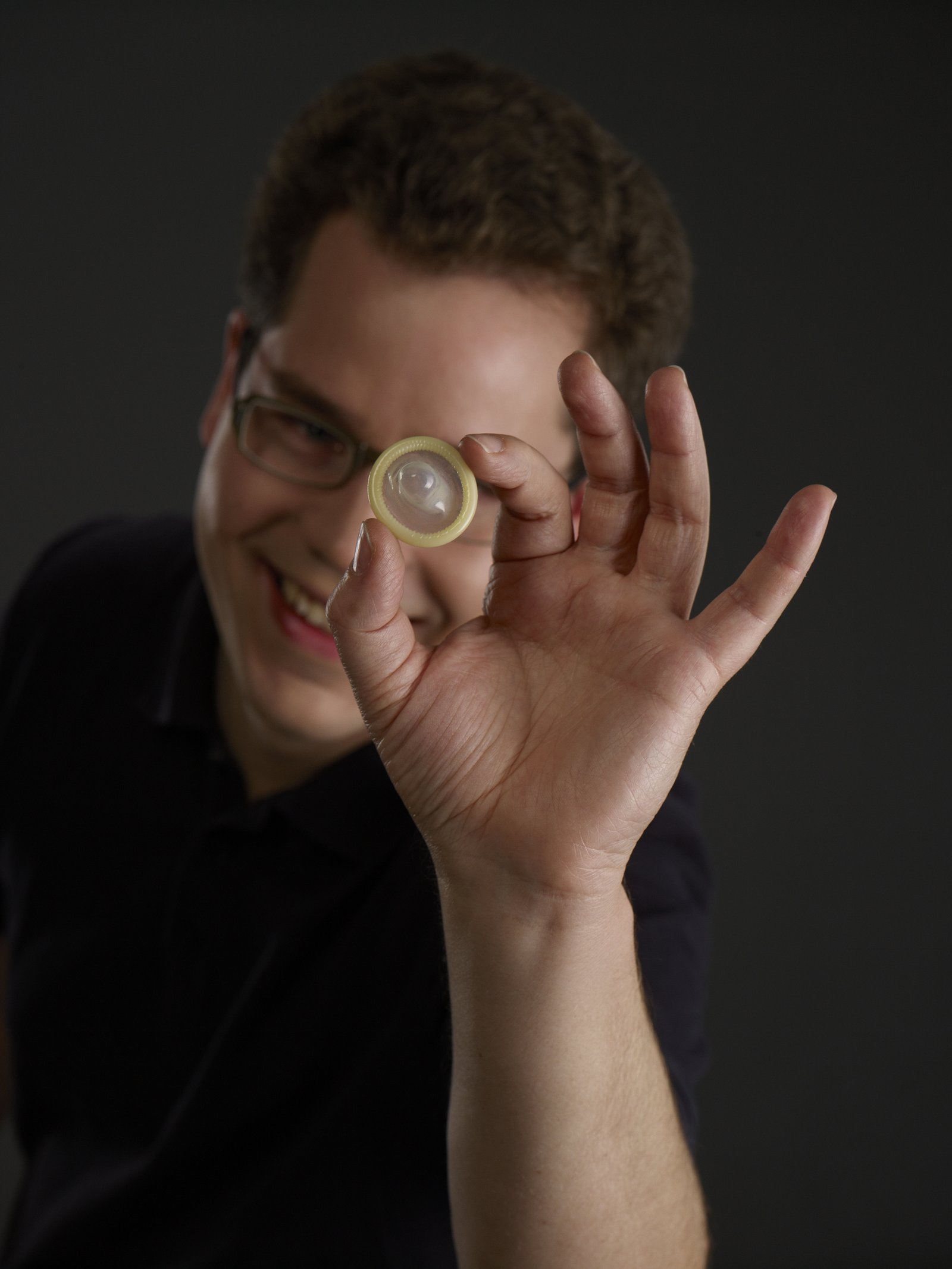 Jan Vinzenz Krause with condom in hand